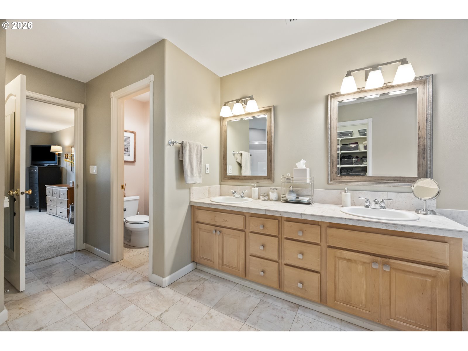 16520 Southwest Marcile Lane Beaverton, OR 97007 - Photo 28 of 45 a bathroom with a double vanity sink and a mirror