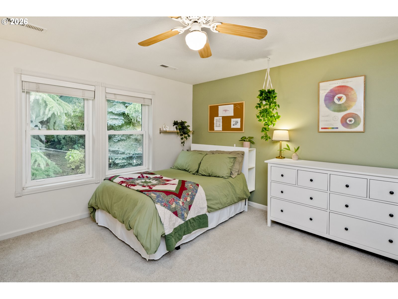16520 Southwest Marcile Lane Beaverton, OR 97007 - Photo 31 of 45 a bedroom with a bed and a window