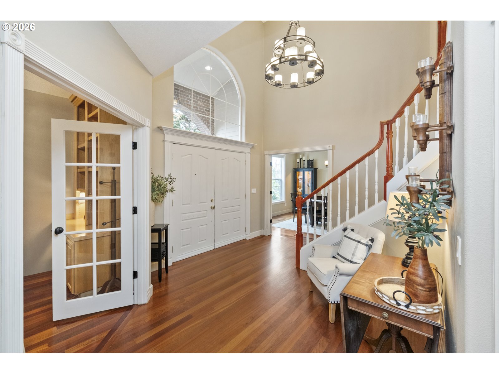 16520 Southwest Marcile Lane Beaverton, OR 97007 - Photo 4 of 45 a view of a hallway with wooden floor and staircase