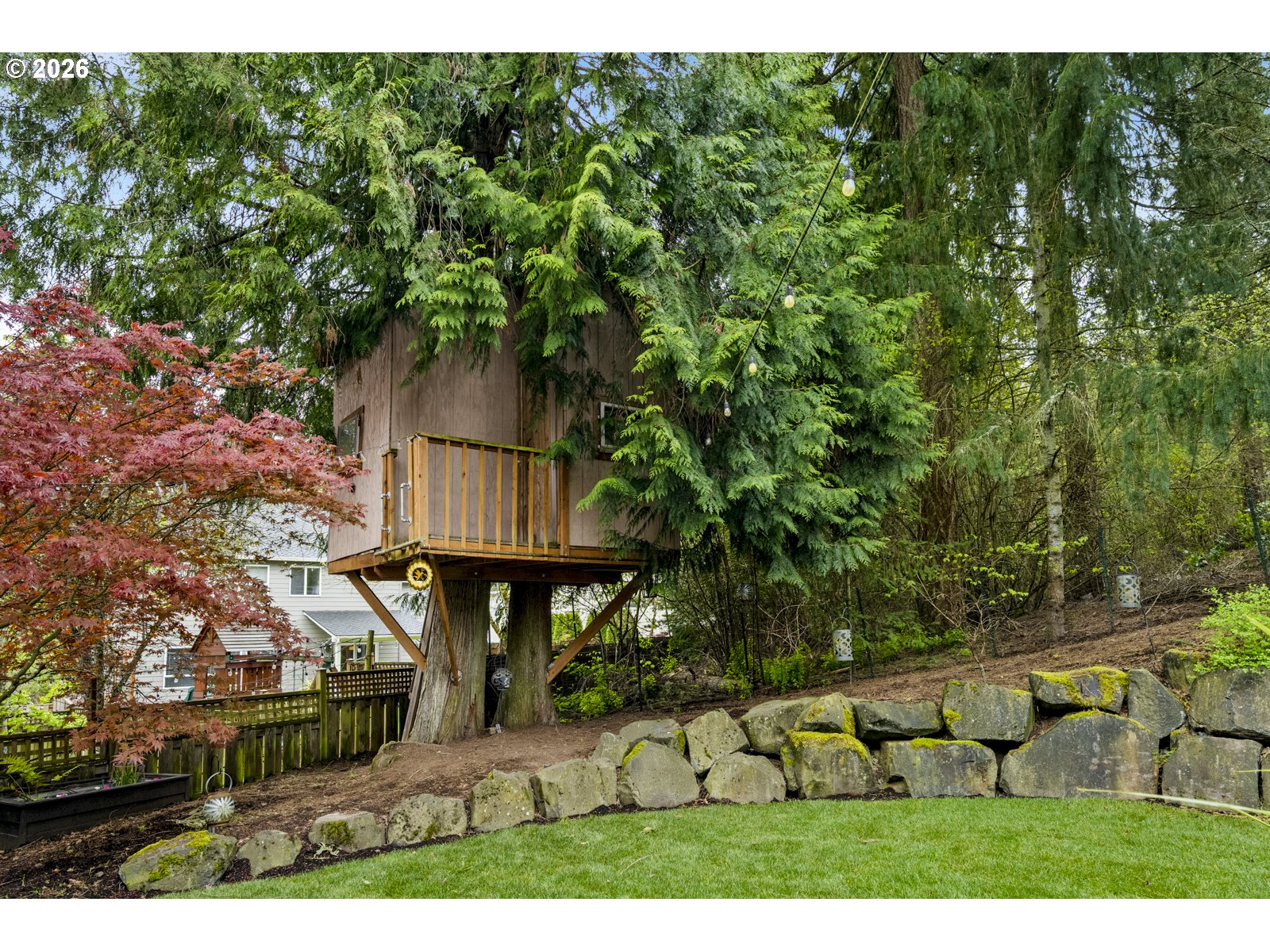 16520 Southwest Marcile Lane Beaverton, OR 97007 - Photo 42 of 45 a view of a bench in the backyard of a house