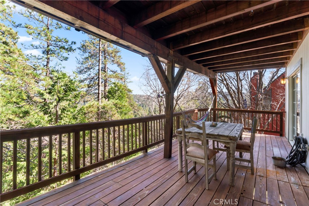 221 Grizzly Road Lake Arrowhead, CA 92352 - Photo 19 of 20 a view of balcony with furniture and wooden deck