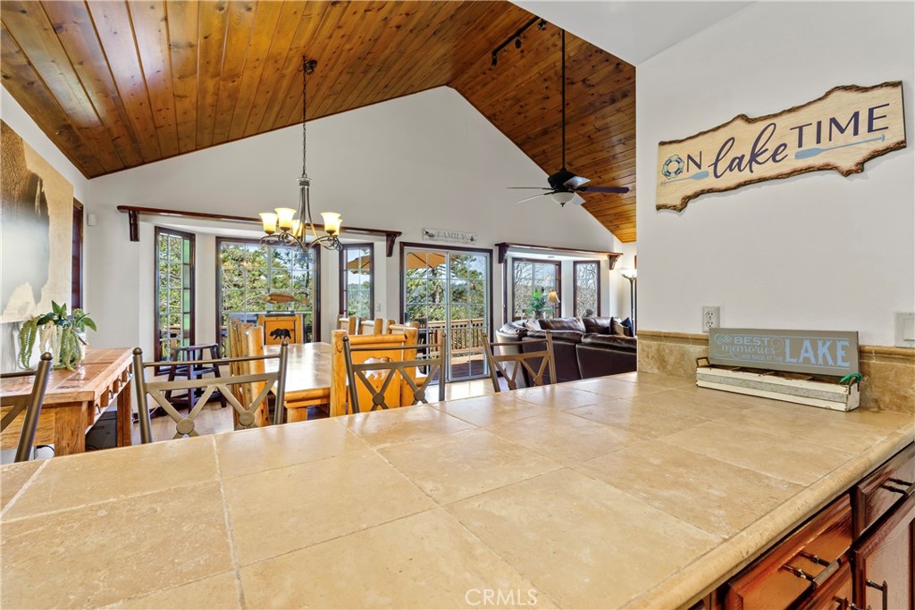221 Grizzly Road Lake Arrowhead, CA 92352 - Photo 5 of 20 a group of people sitting in a living room