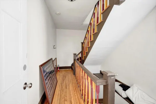 a view of entryway with wooden floor
