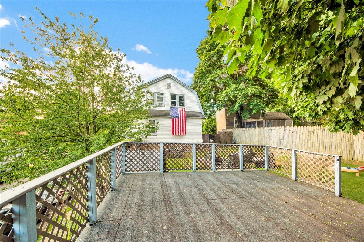 308 5th Avenue New Rochelle, NY 10801 - Photo 29 of 37 a view of balcony with wooden floor and fence