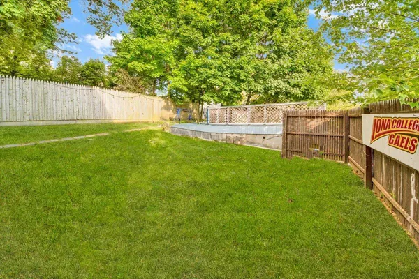 a view of a backyard with a small cabin