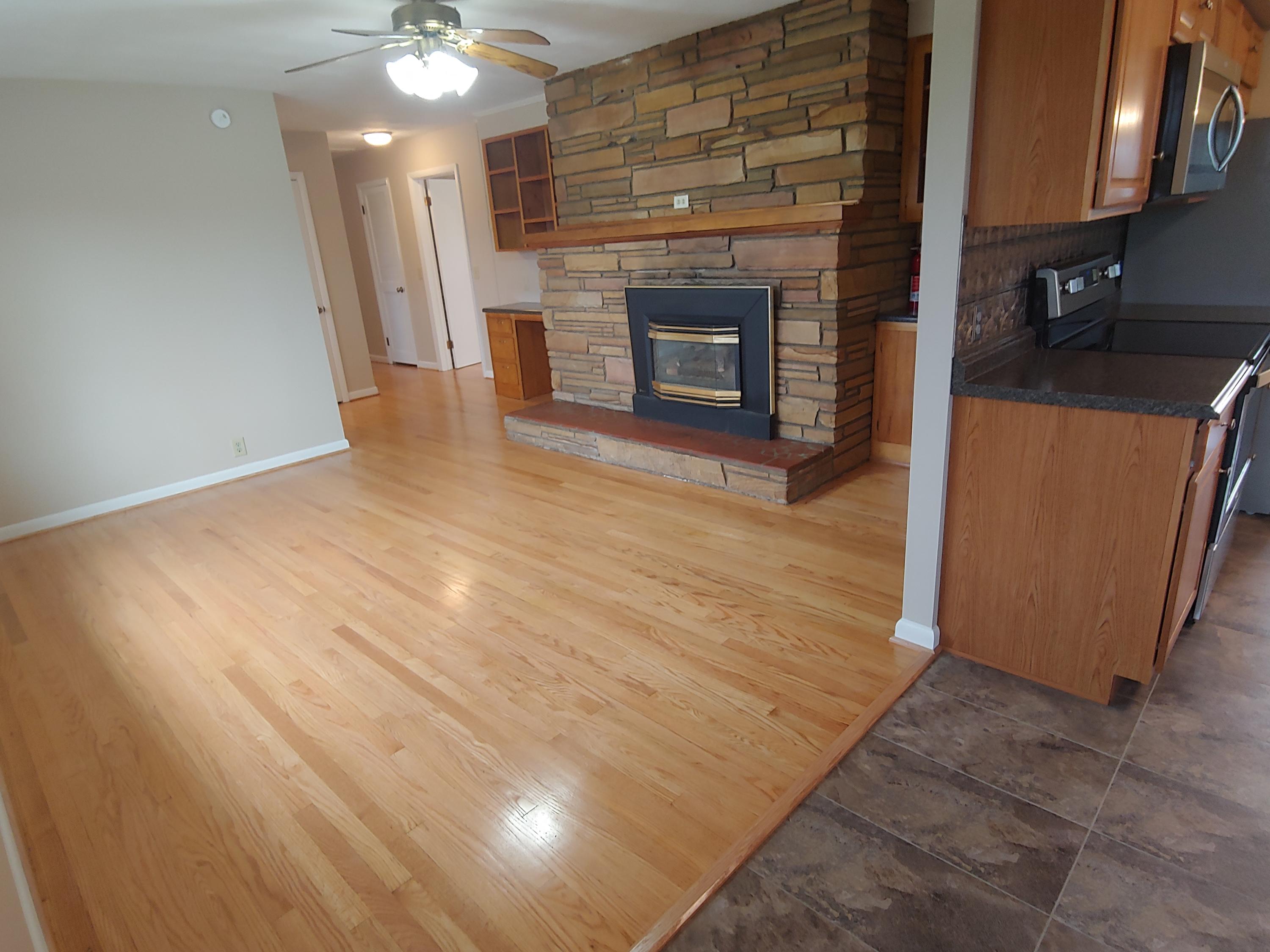 706 Alum Ridge Road Northwest Willis, VA 24380 - Photo 13 of 56 a view of a livingroom with a fireplace