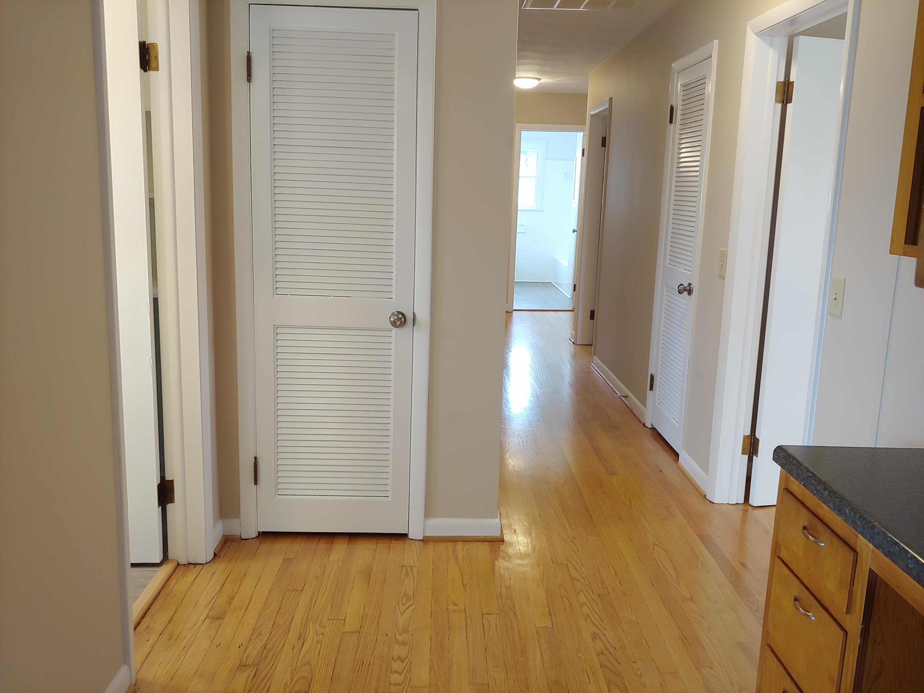 706 Alum Ridge Road Northwest Willis, VA 24380 - Photo 21 of 56 a view of a hallway with wooden floor
