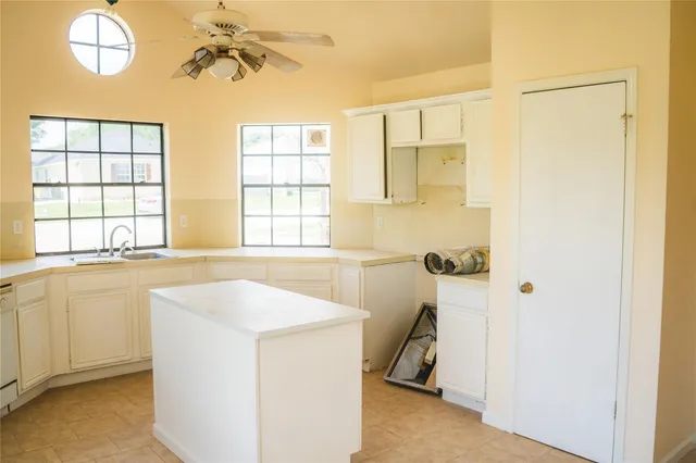 a view of a kitchen with a sink
