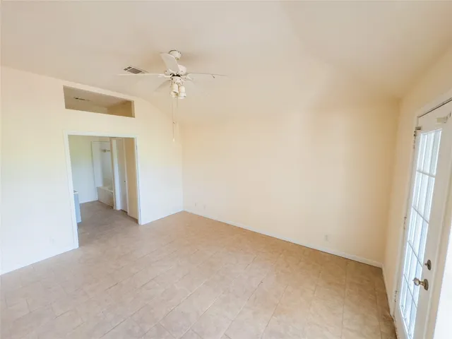 a bathroom with a bathtub and a toilet