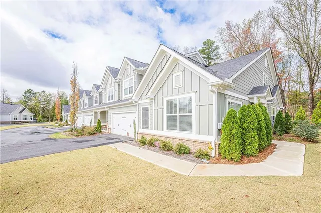 front view of a house with a street