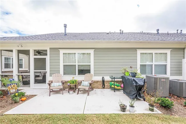 a view of a house with a snow in the yard