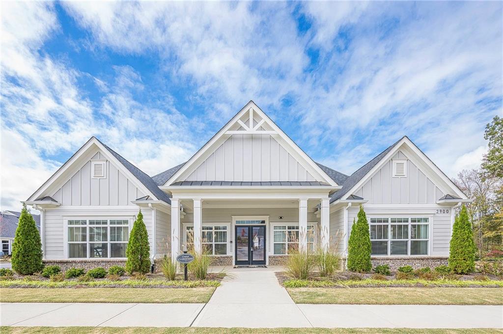 701 Calypso Way Cumming, GA 30040 - Photo 46 of 54 front view of a house with a porch