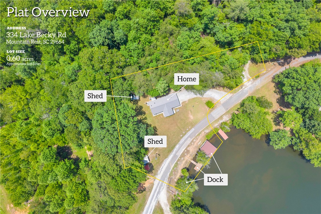 334 Lake Becky Road Mountain Rest, SC 29664 - Photo 47 of 48 An aerial perspective reveals a secluded lakeside home nestled among dense woodland, complete with private dock access.