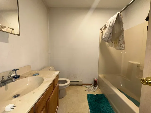 a bathroom with a sink and a tub