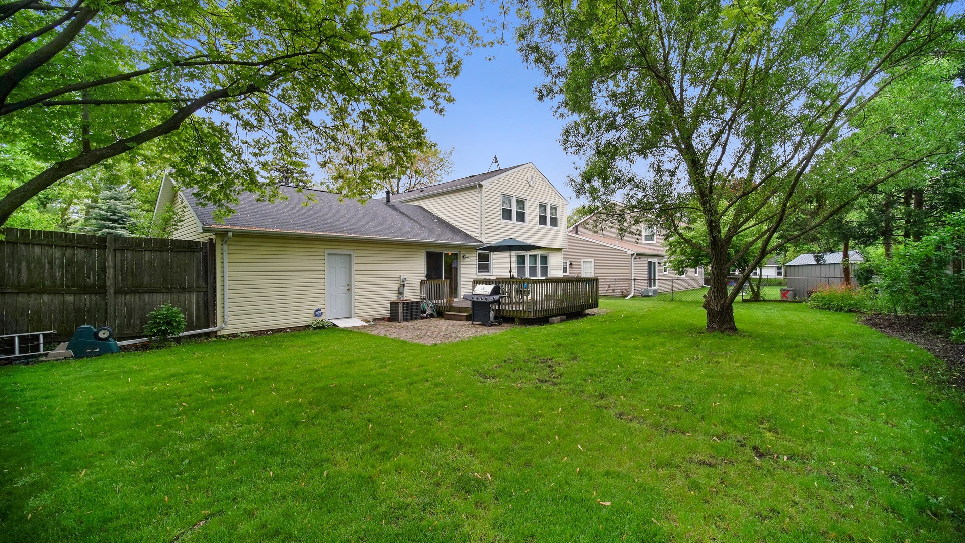 30 Timber Hill Road Buffalo Grove, IL 60089 - Photo 22 of 23 a front view of a house with yard and tree s