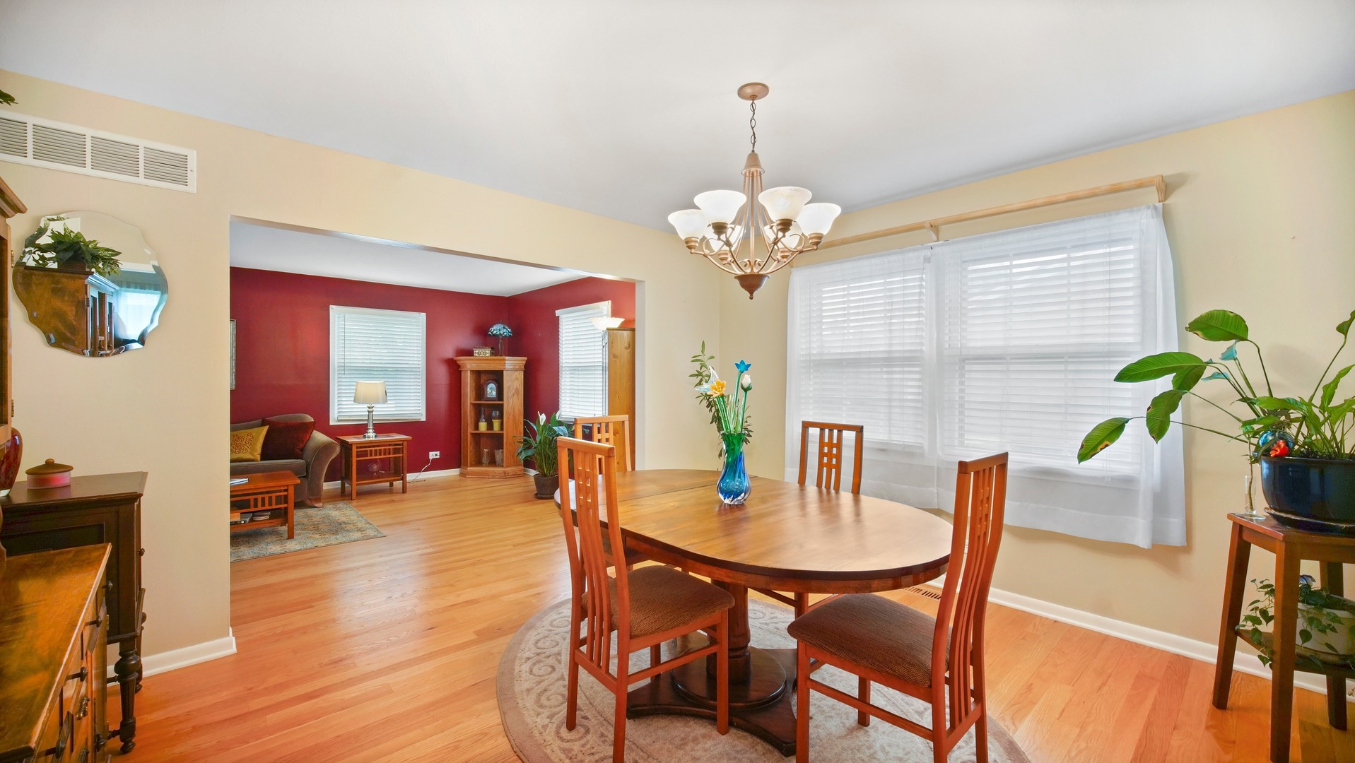 30 Timber Hill Road Buffalo Grove, IL 60089 - Photo 5 of 23 a view of a dining room with furniture wooden floor and chandelier