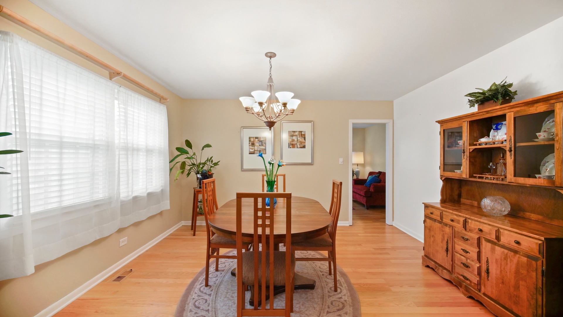30 Timber Hill Road Buffalo Grove, IL 60089 - Photo 6 of 23 a view of a dining room with furniture and window