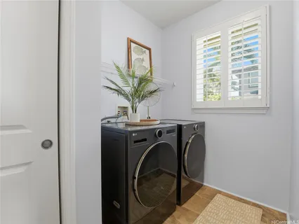 a view of livingroom with washer and dryer
