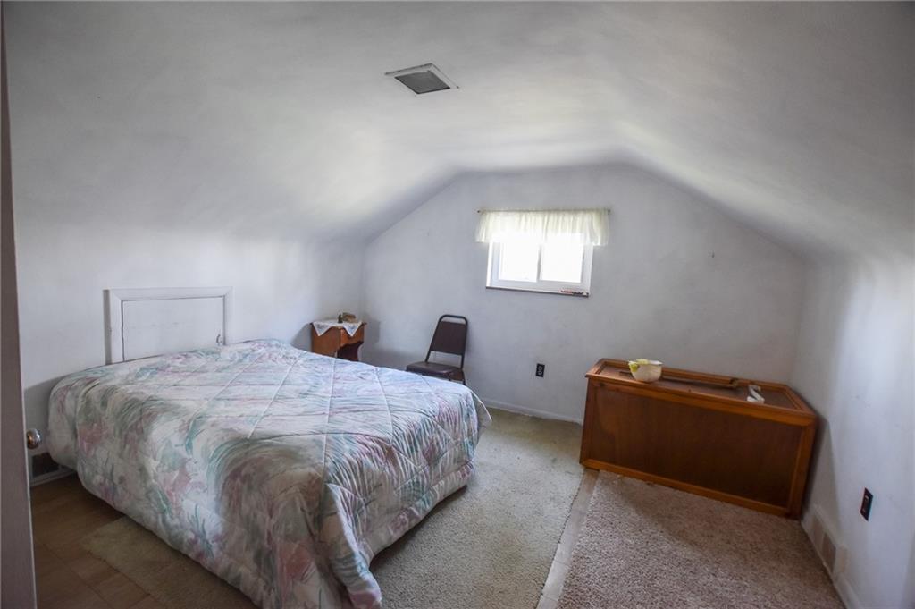109 Neupert Road Cabot, PA 16023 - Photo 11 of 17 a bedroom with a bed and a window
