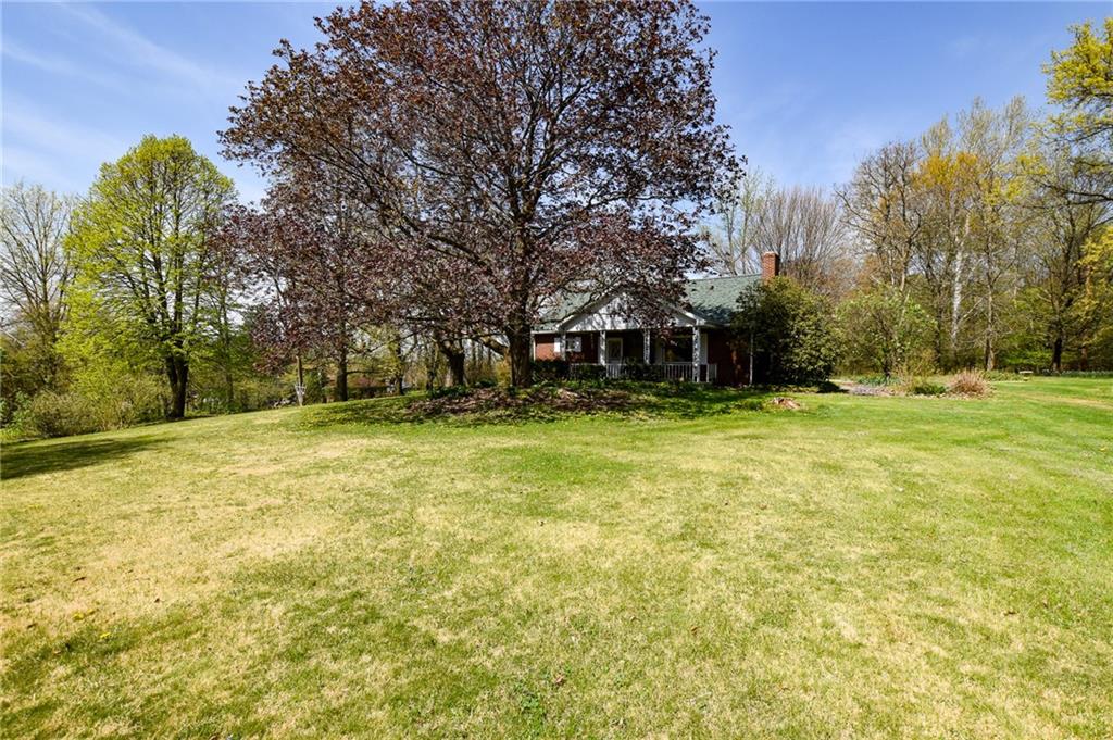 109 Neupert Road Cabot, PA 16023 - Photo 2 of 17 a swimming pool with trees in the background
