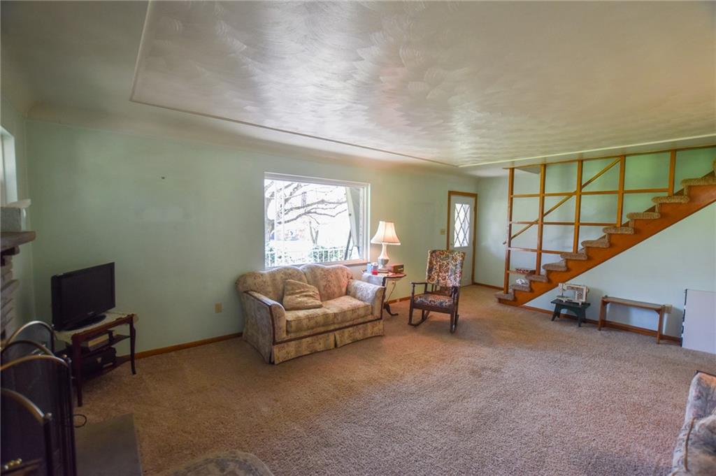 109 Neupert Road Cabot, PA 16023 - Photo 3 of 17 a living room with furniture and a flat screen tv