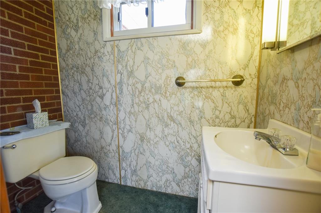 109 Neupert Road Cabot, PA 16023 - Photo 8 of 17 a bathroom with a sink a toilet and shower