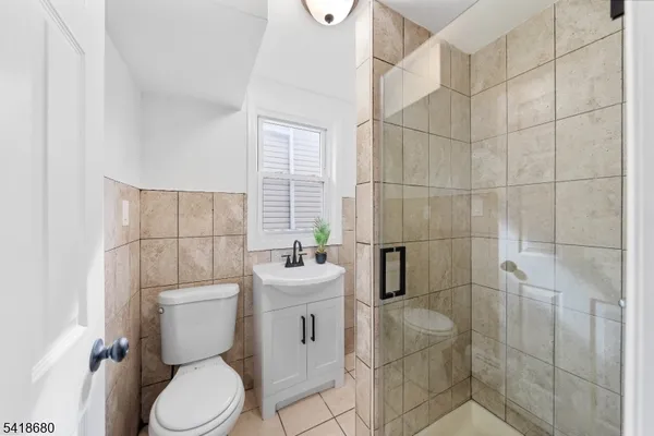 a view of a house with large windows