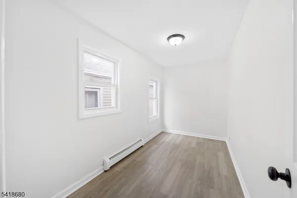 a view of a room that has a window in it