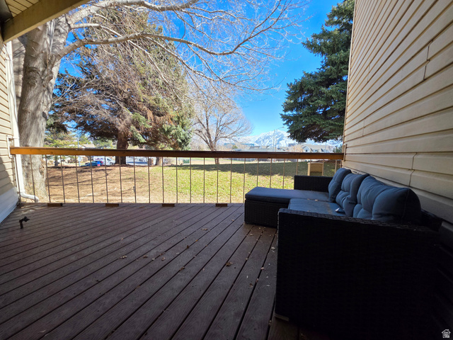 5265 South Rome Beauty Park Murray, UT 84123 - Photo 34 of 35 Wooden deck with a yard and an outdoor lounge area