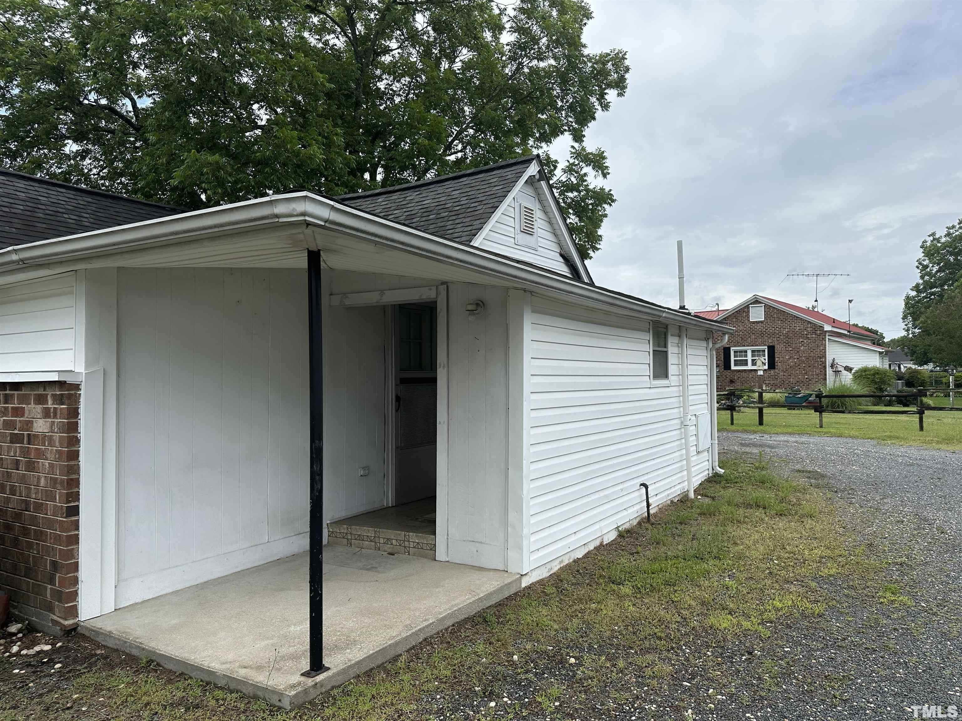 265 Iris Bryant Road Erwin, NC 28339 - Photo 11 of 11 a view of a small house with a yard