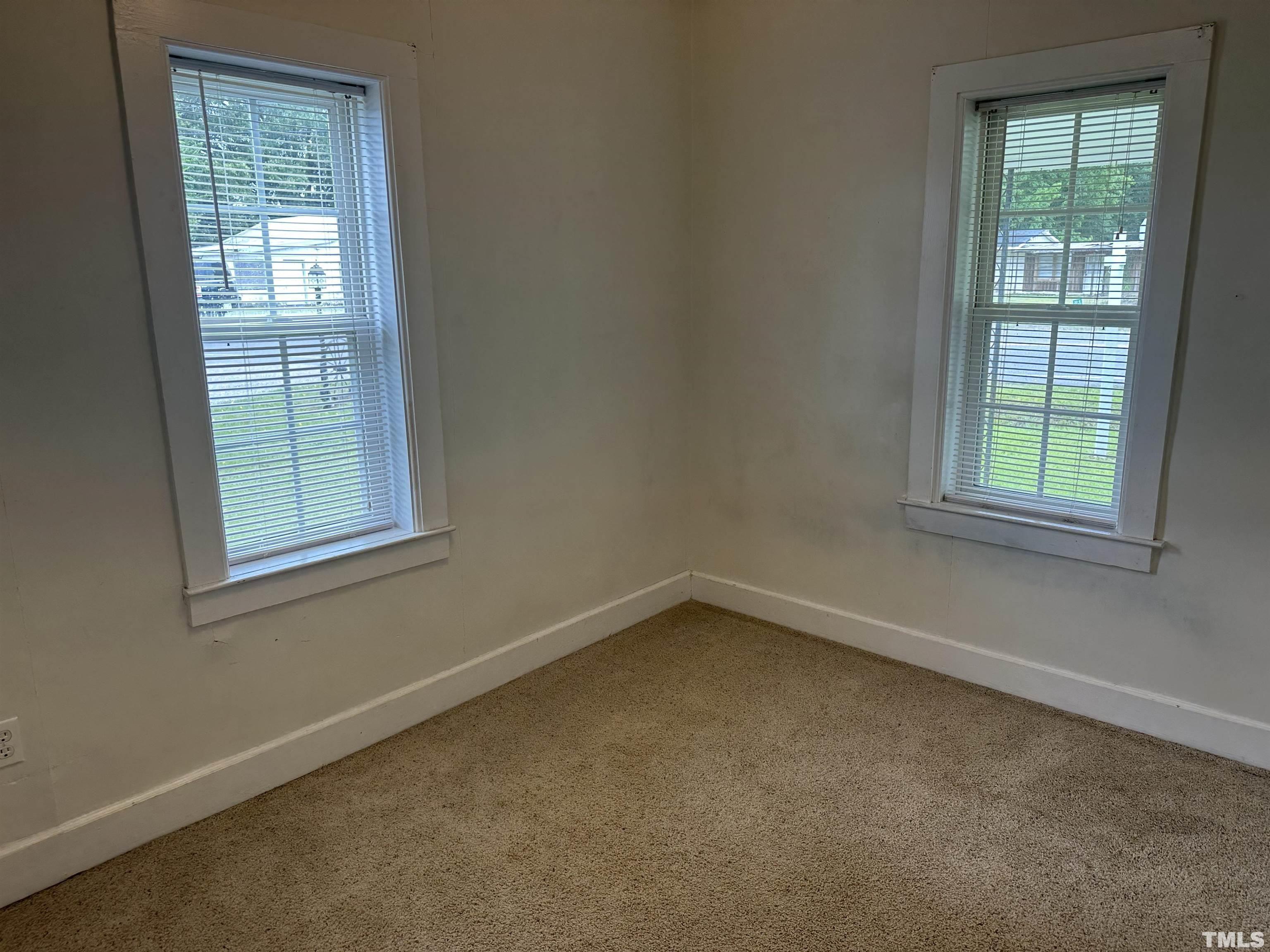 265 Iris Bryant Road Erwin, NC 28339 - Photo 7 of 11 an empty room with a window