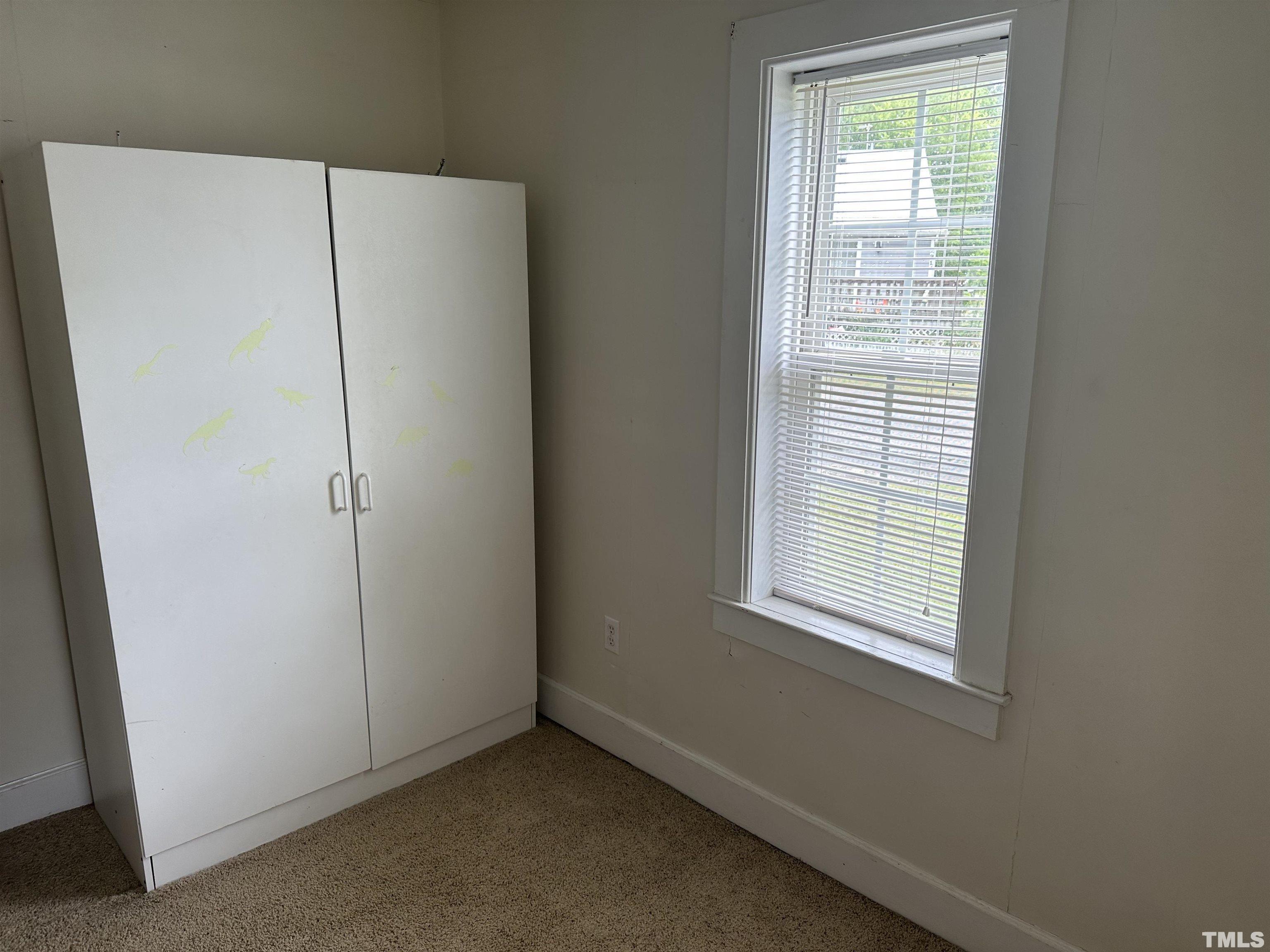 265 Iris Bryant Road Erwin, NC 28339 - Photo 8 of 11 a view of a room that has a window in it