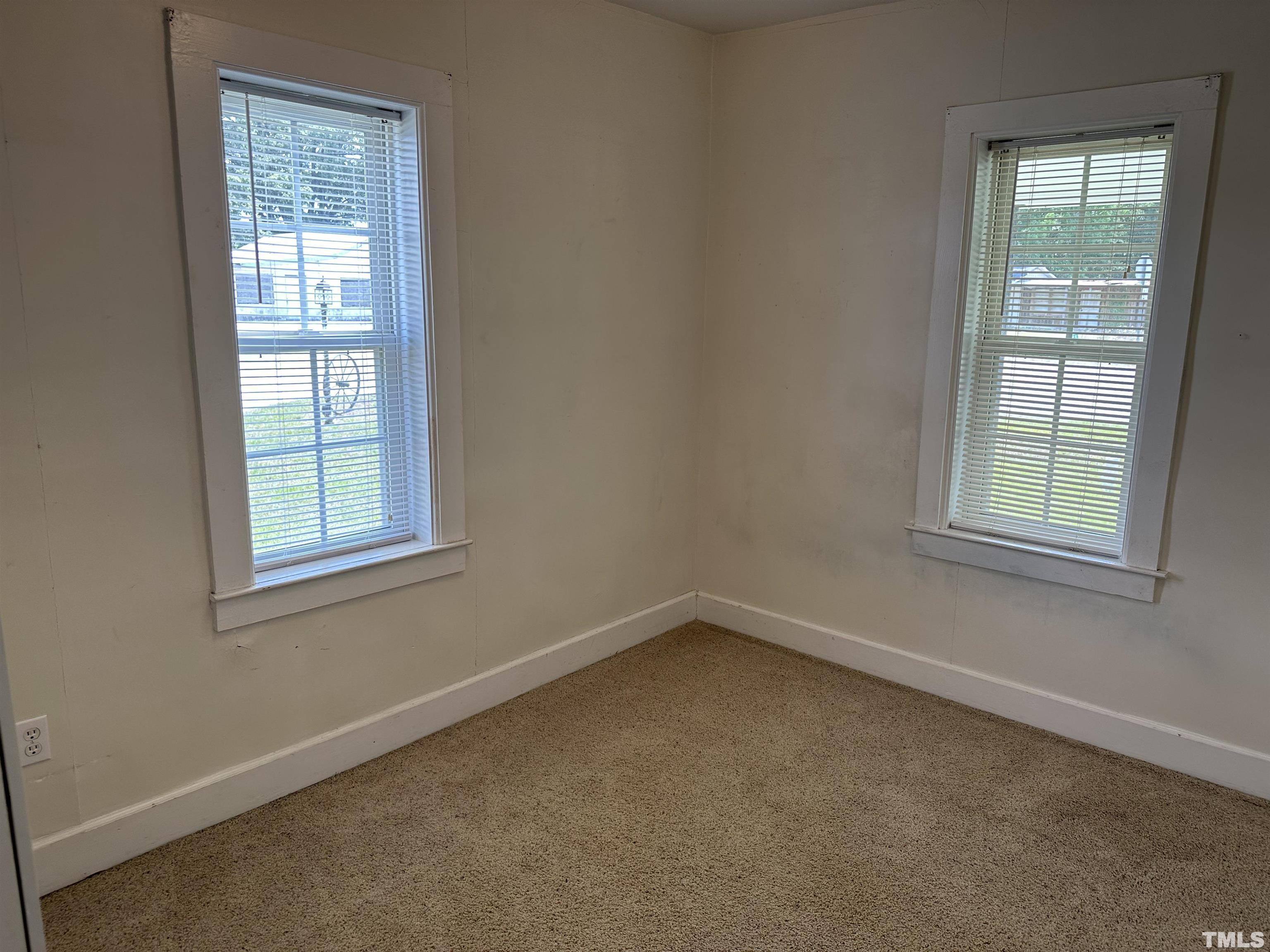 265 Iris Bryant Road Erwin, NC 28339 - Photo 10 of 11 an empty room with a window