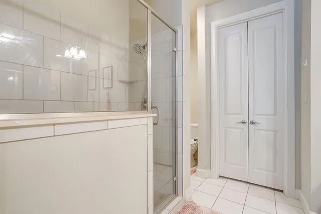 a view of a swimming pool with outdoor seating