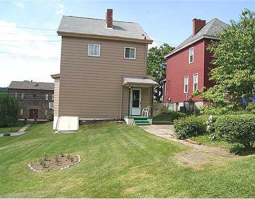 512 Friday Road Pittsburgh, PA 15209 - Photo 2 of 14 Exterior Back. Great rear yard, continues to Minert Street. Off-street parking opportunity.