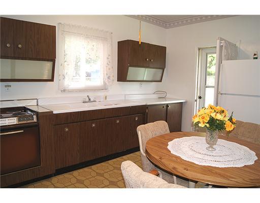 512 Friday Road Pittsburgh, PA 15209 - Photo 3 of 14 Kitchen. Rear entrance to eat-in kitchen boasts 9 ceilings, electric stove, refrigerator, pantry plus kitchen table &chairs!