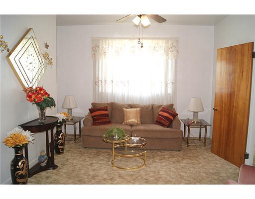 512 Friday Road Pittsburgh, PA 15209 - Photo 6 of 14 Living Room. Flowing from the dining room is the tastefully decorated living room! Comes complete with ceiling fan & triple front windows for an abundance of natural light. 9 ceilings throughout 1st floor! Furniture included!!!