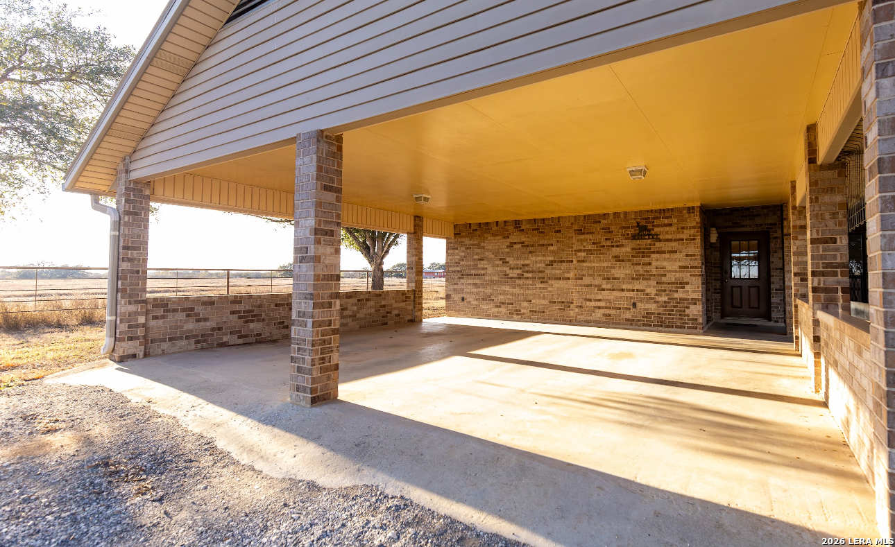 375 Bluntzer Road Jourdanton, TX 78026 - Photo 22 of 44 a view of a balcony