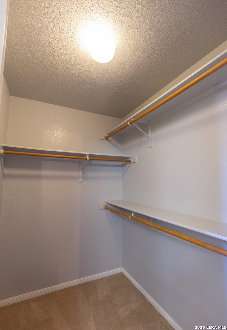 375 Bluntzer Road Jourdanton, TX 78026 - Photo 32 of 44 a close up view of racks on the wall