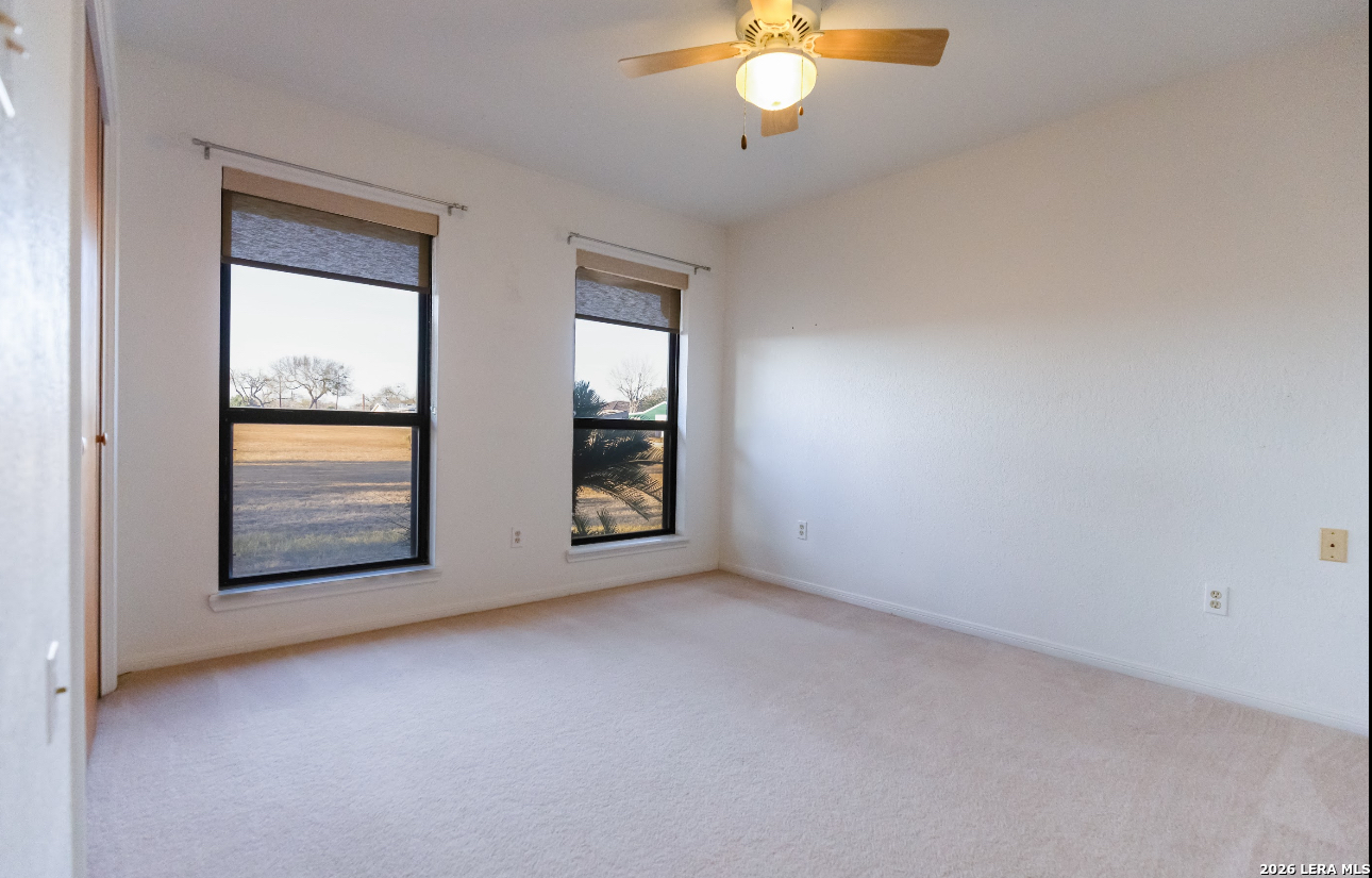 375 Bluntzer Road Jourdanton, TX 78026 - Photo 36 of 44 an empty room with window
