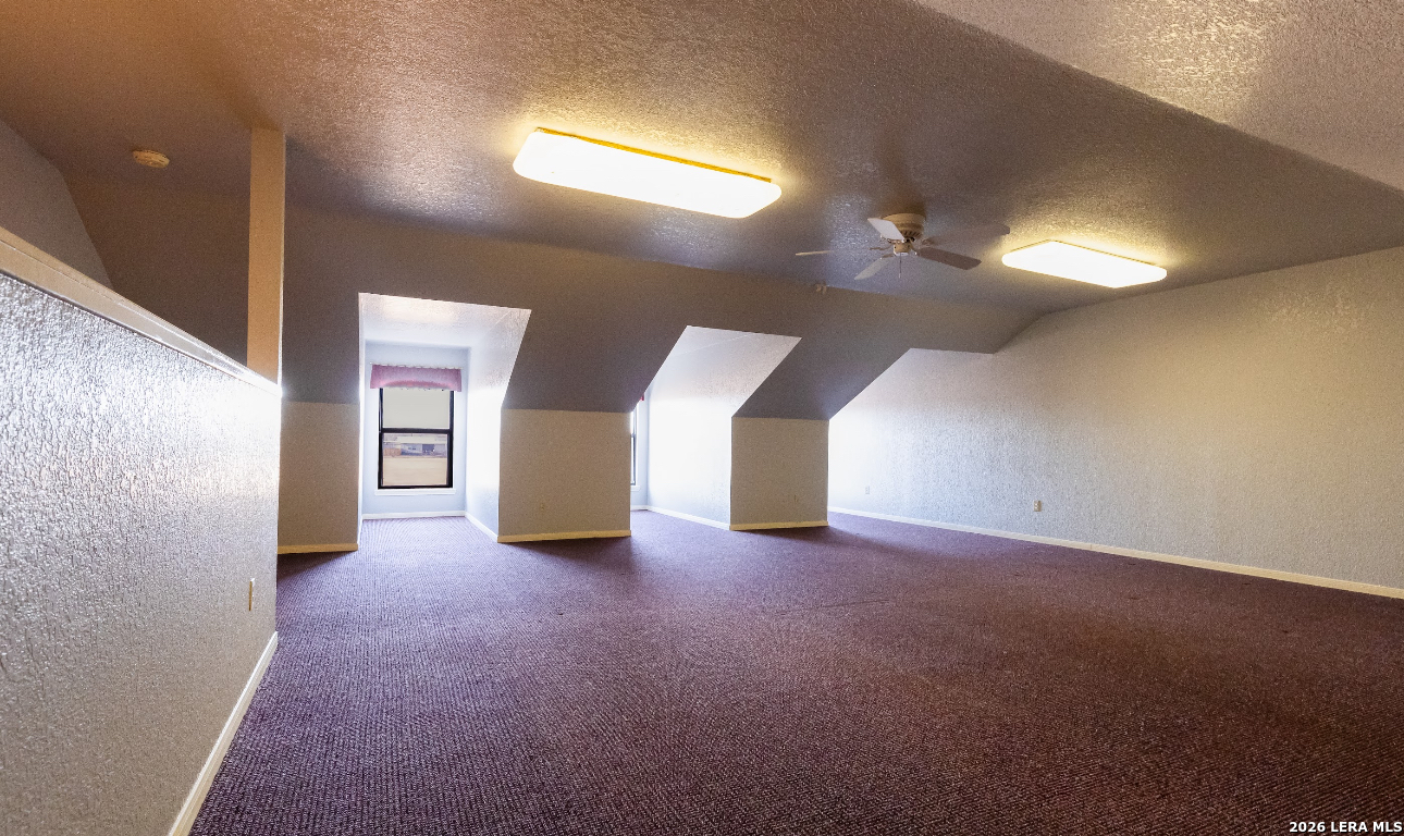 375 Bluntzer Road Jourdanton, TX 78026 - Photo 43 of 44 a view of an empty room with a windows