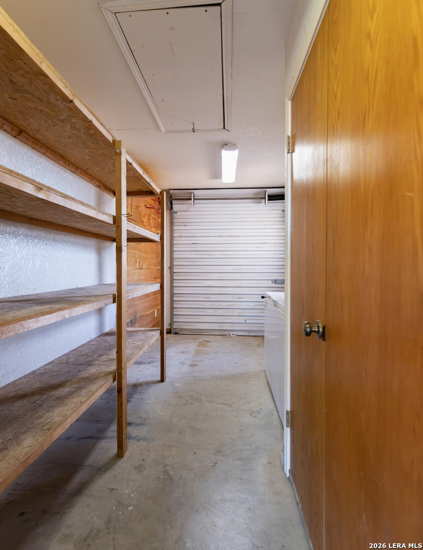 375 Bluntzer Road Jourdanton, TX 78026 - Photo 44 of 44 a view of a hallway with closet