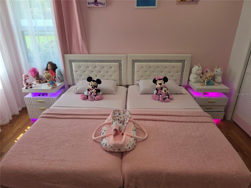 13128 Hazelcrest Street Spring Hill, FL 34609 - Photo 27 of 46 a bathroom with a sink and a mirror