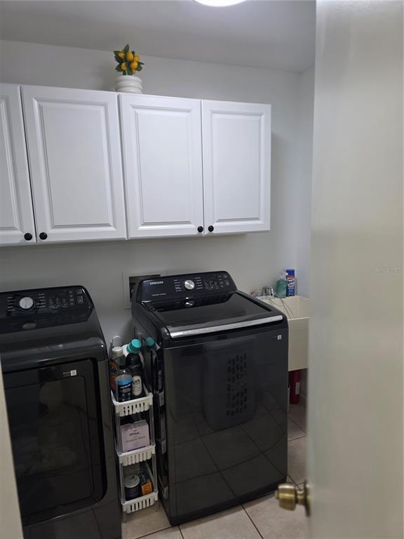 13128 Hazelcrest Street Spring Hill, FL 34609 - Photo 29 of 46 a stove top oven sitting inside of a kitchen