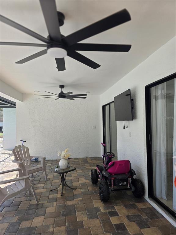 13128 Hazelcrest Street Spring Hill, FL 34609 - Photo 34 of 46 a living room with furniture