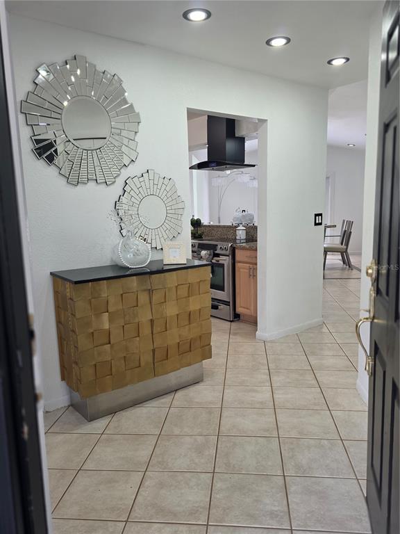 13128 Hazelcrest Street Spring Hill, FL 34609 - Photo 9 of 46 a view of kitchen with furniture