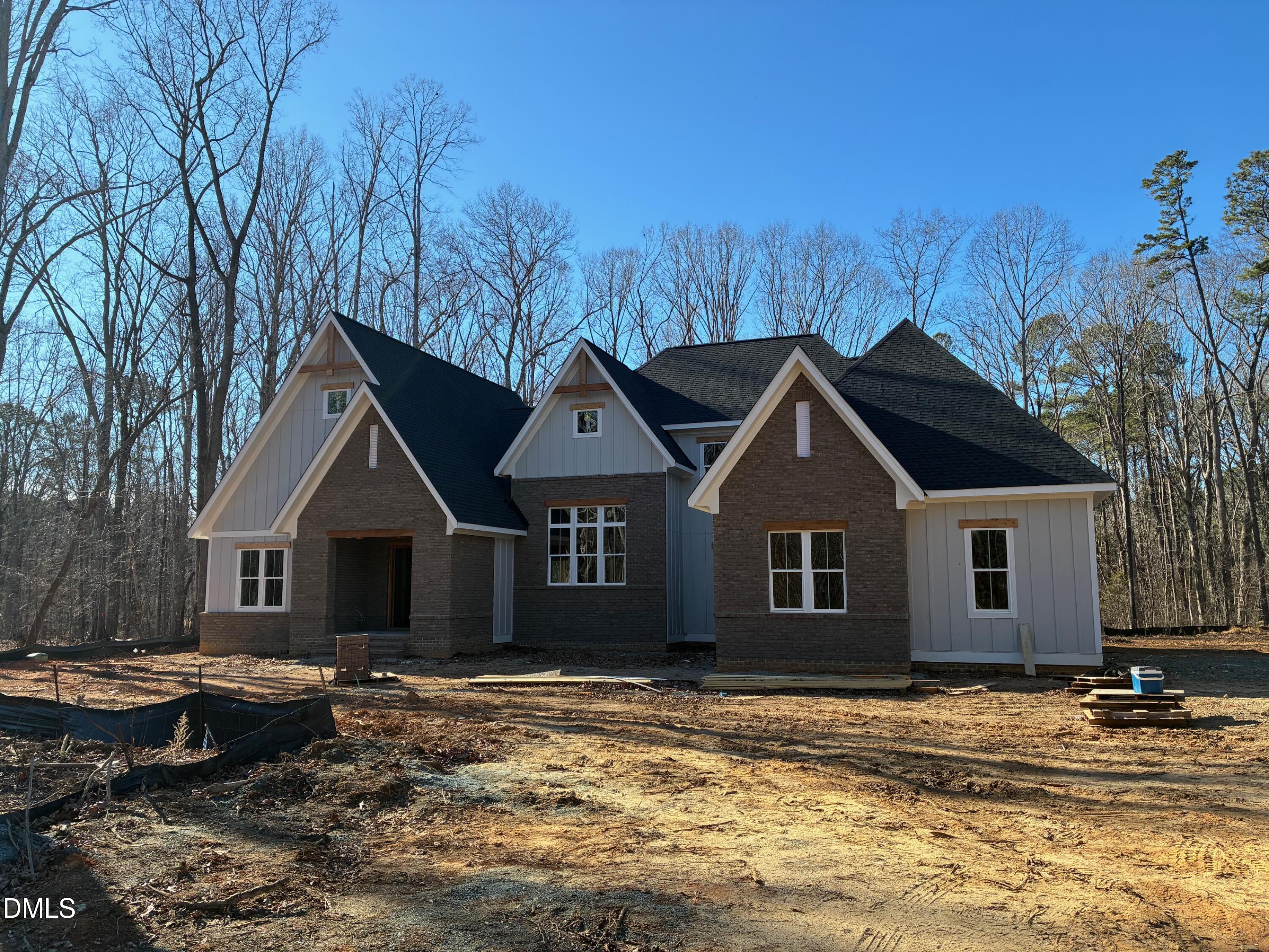 638 Old Goldston Road Pittsboro, NC 27312 - Photo 28 of 28 a house that has a tree in front of it