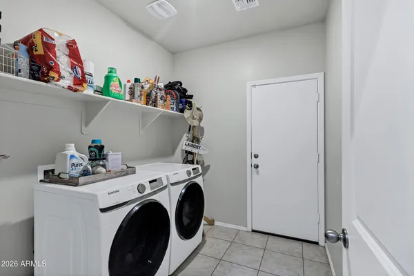 a storage room with washer and dryer