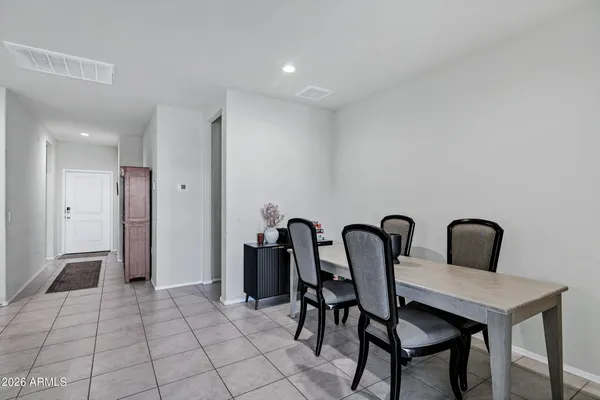 a table and chairs in a room