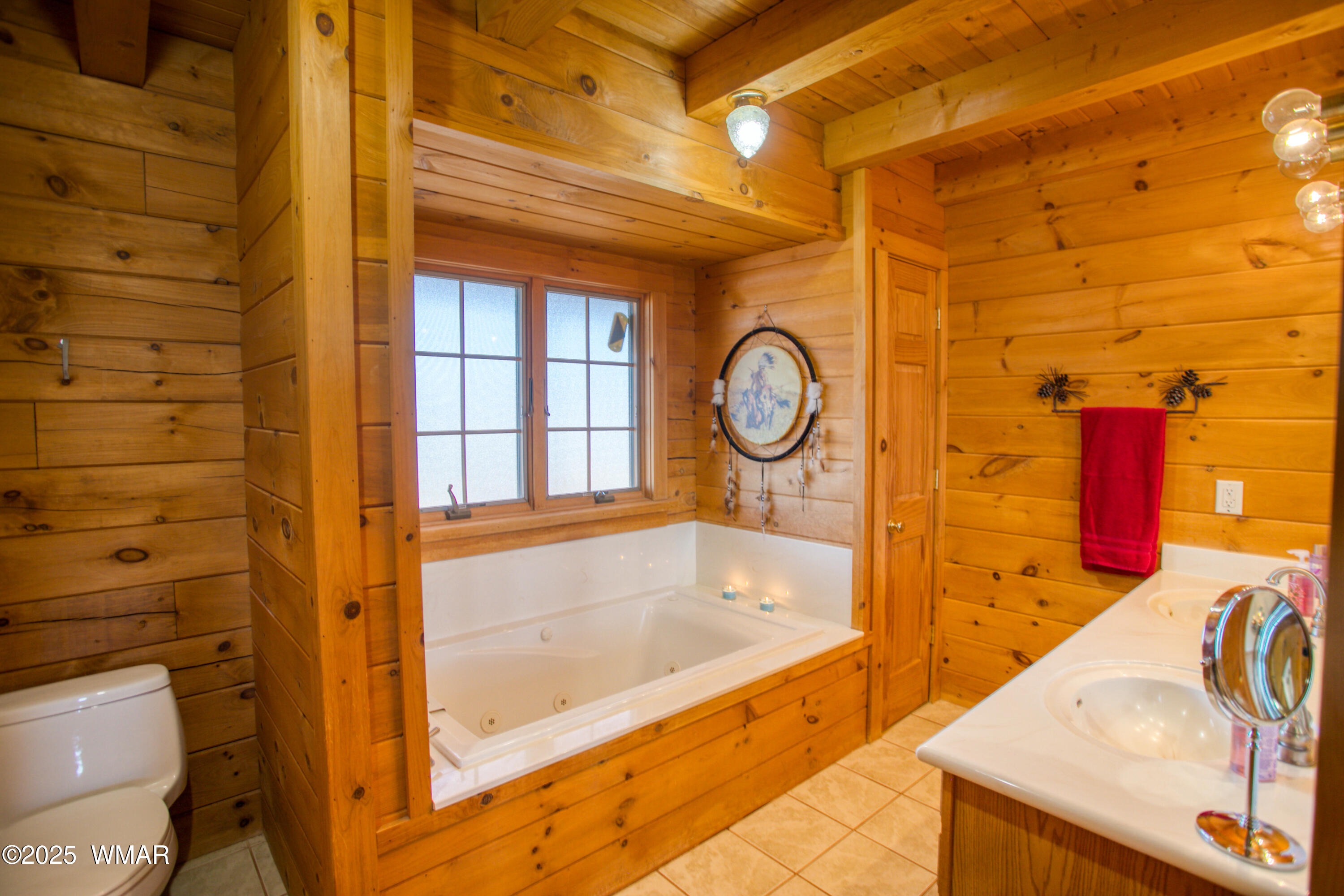 8555 Reata Lane Snowflake, AZ 85937 - Photo 28 of 88 a bathroom with a tub sink and mirror